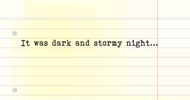 Lined writing paper with the text 'It was a dark and stormy night...' typed on it